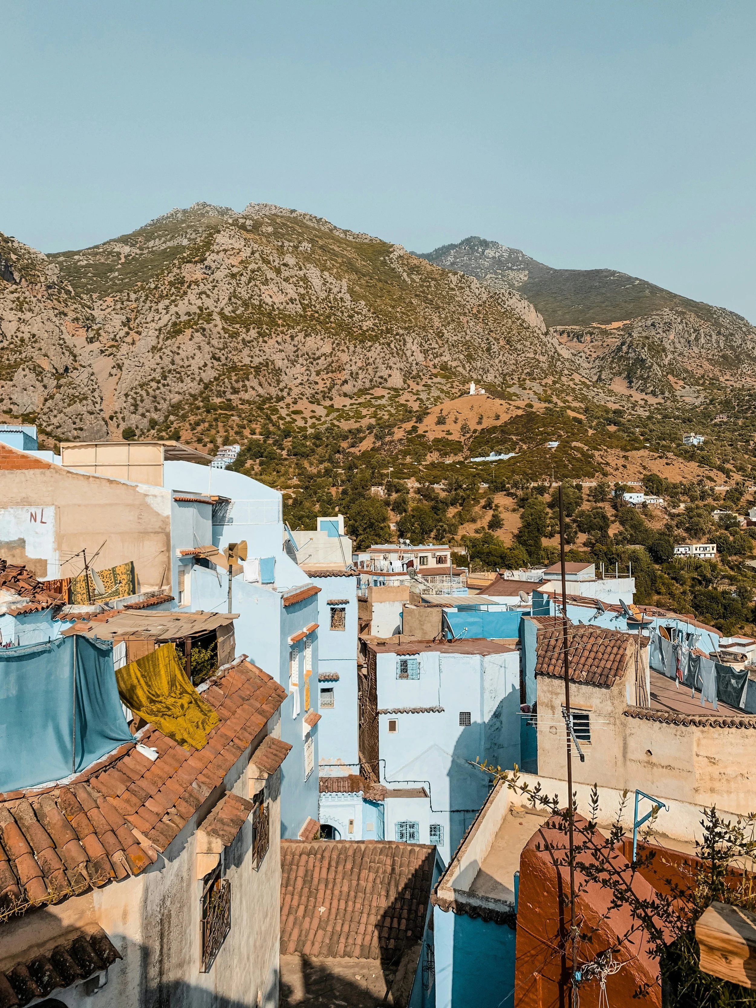 Morocco Vistas | Moorish & Andalusian Heritage — blue and white hillside village, Chefchaouen, Morocco