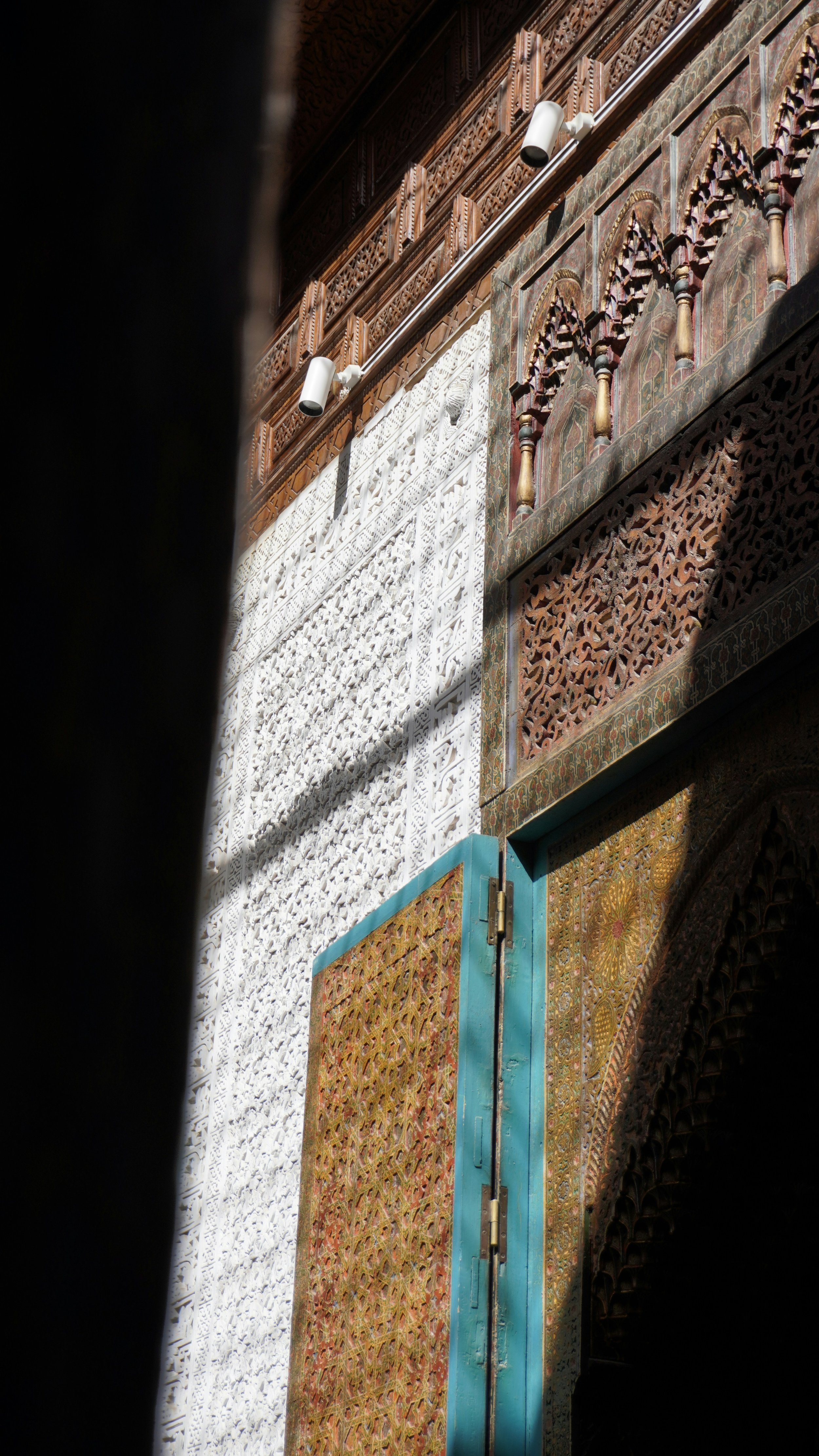Morocco Vistas | Moorish & Andalusian Heritage — carved wood latticework and turquoise mashrabiya, Dar El Bacha, Marrakech