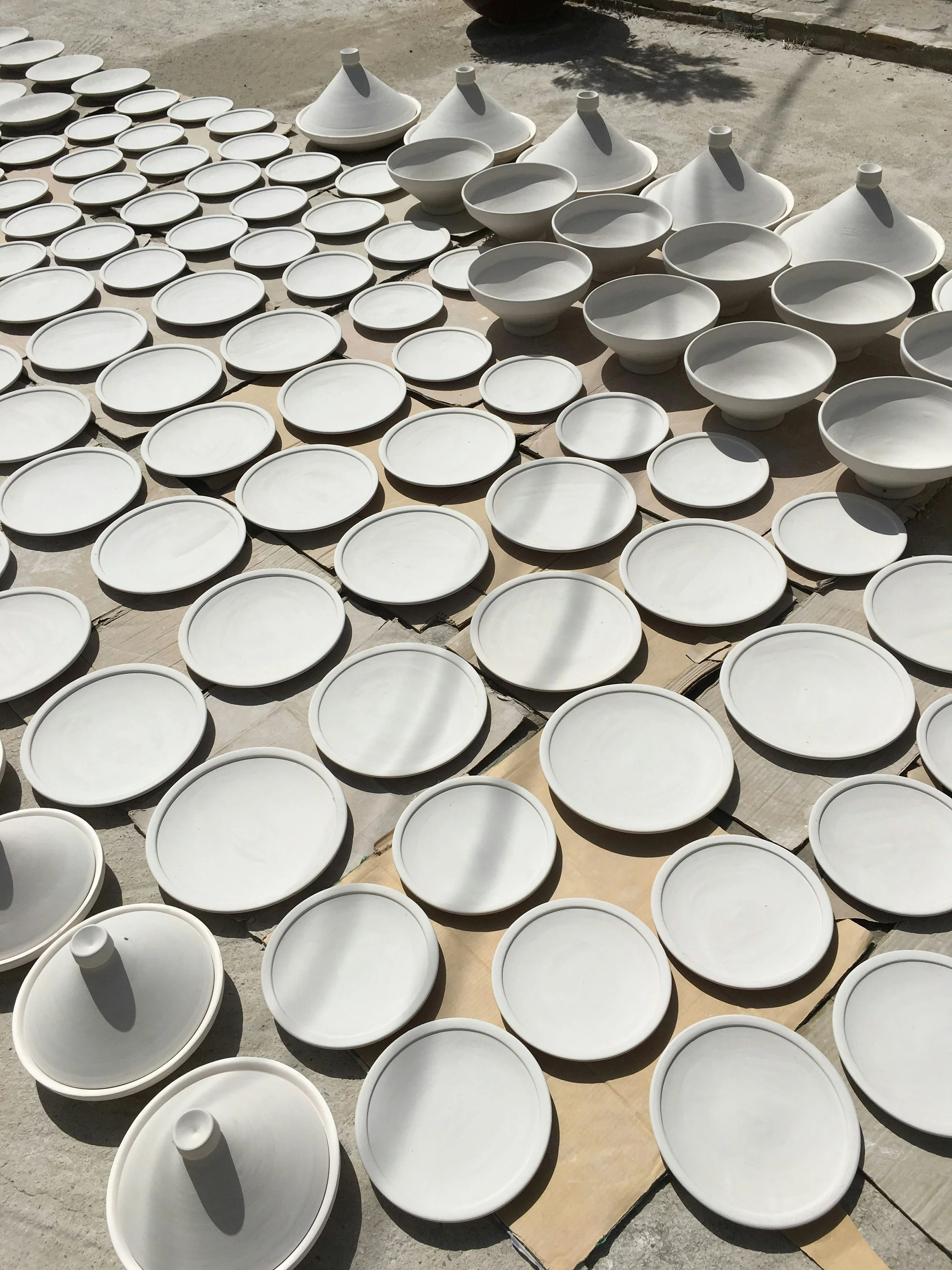 Morocco Vistas | Moorish & Andalusian Heritage — traditional ceramic pottery drying, artisan workshop, Fez