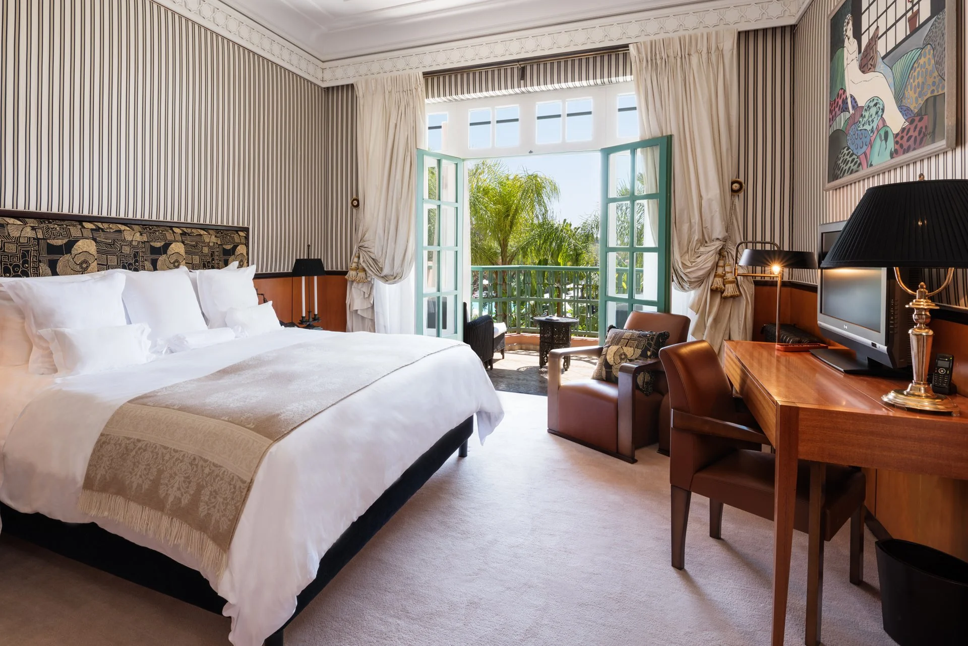 La Mamounia luxury suite with garden view, writing desk and elegant furnishings, Marrakech - five-star accommodation on Morocco Vistas Southern Oasis tour
