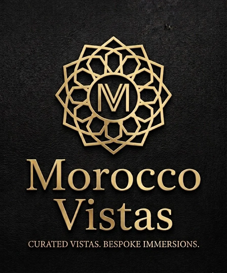 Luxury logo for Morocco Vistas featuring a gold geometric pattern and elegant gold text on a black background, with the tagline 'Curated Vistas. Bespoke Immersions.'
