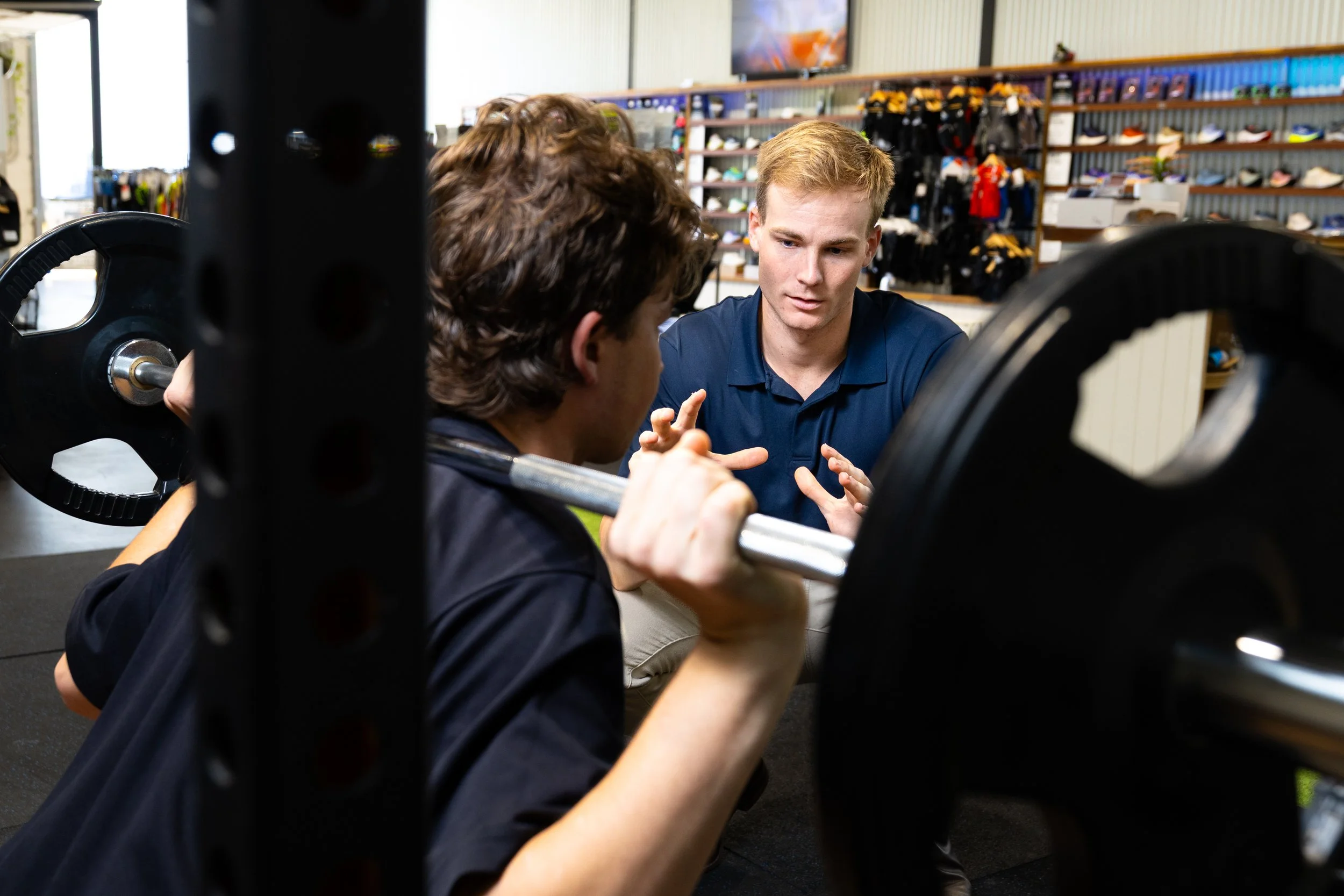 Client performing strength rehabilitation and weight training at KOR Physio