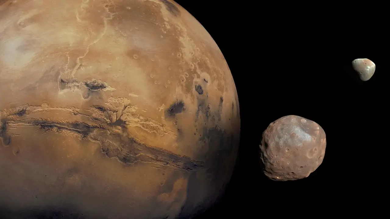 Space scene showing the planets Mars, Mercury, and two moons against a black background.