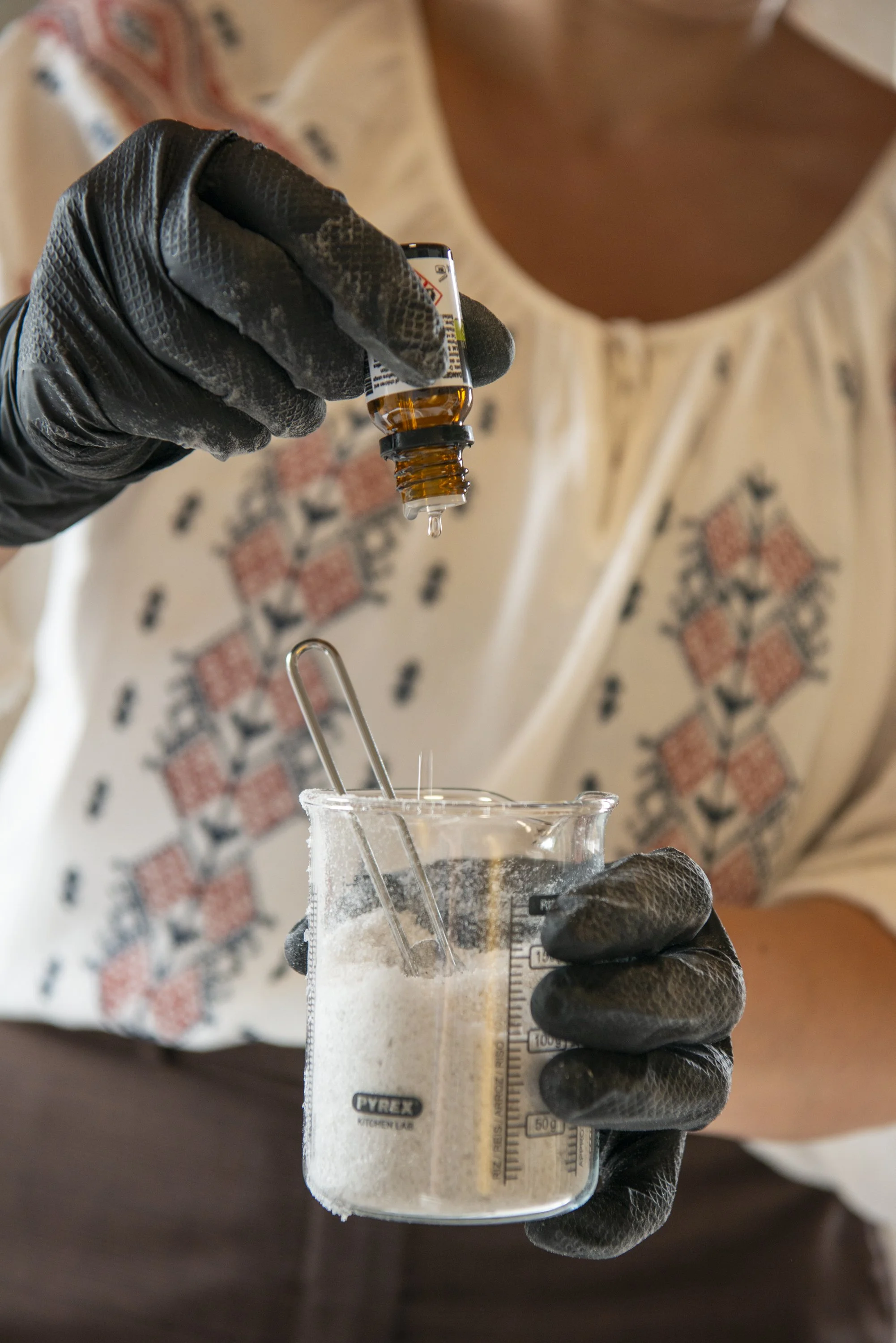 Mariana from Salt Cave Therapy Wexford adding some essential oils to her luxury bath salts