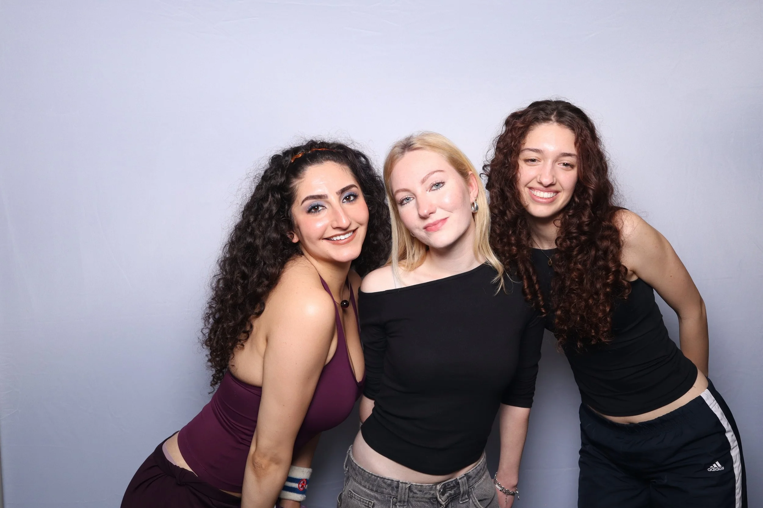 Three fashionable young women celebrating culture, music, fashion, and soul at kraniraivu social event party. 