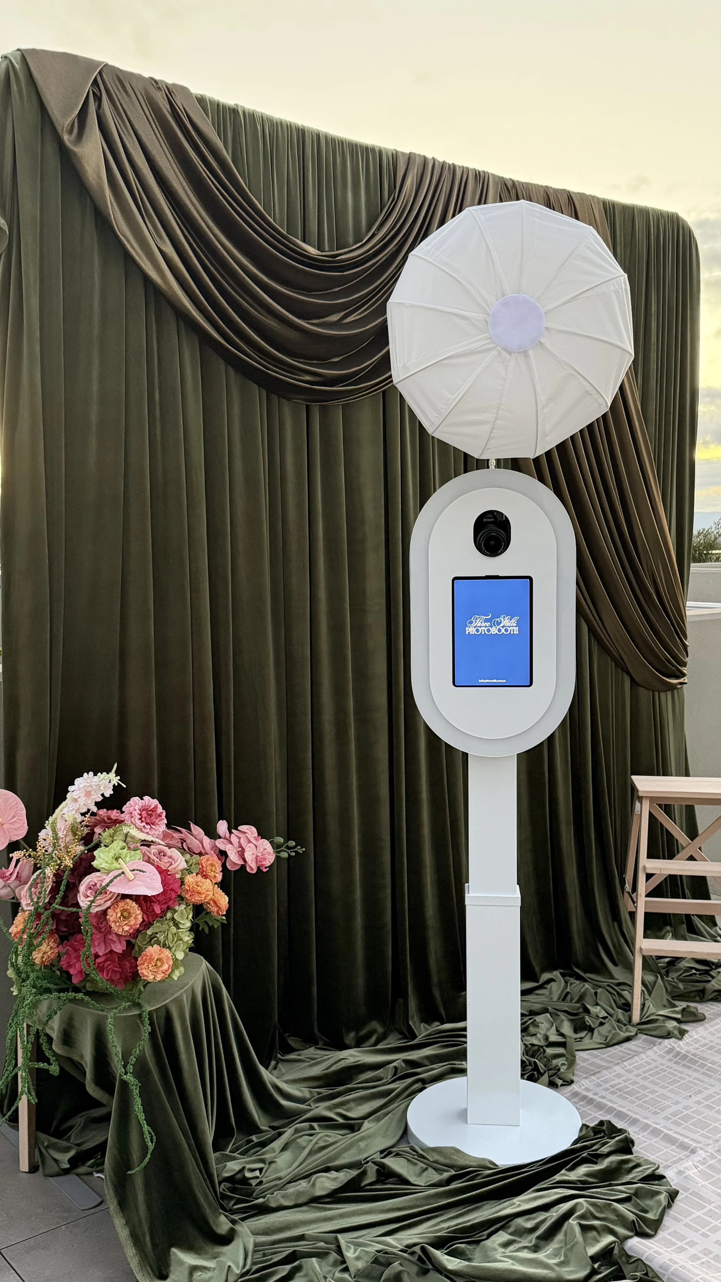 luxury photo booth in Sydney that complements our drapery/drapes background in olive green