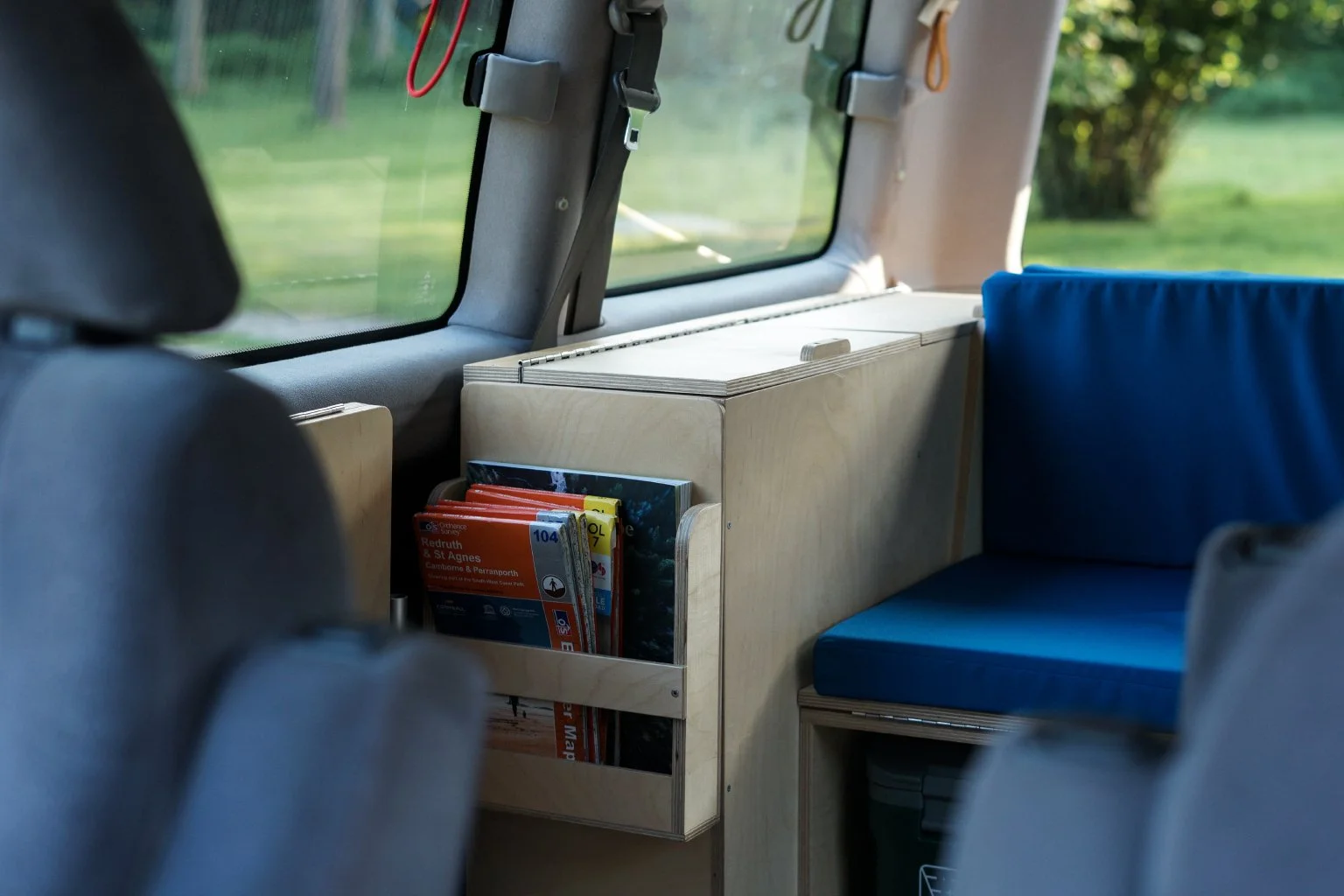  Side storage cupboards complete with map holder 