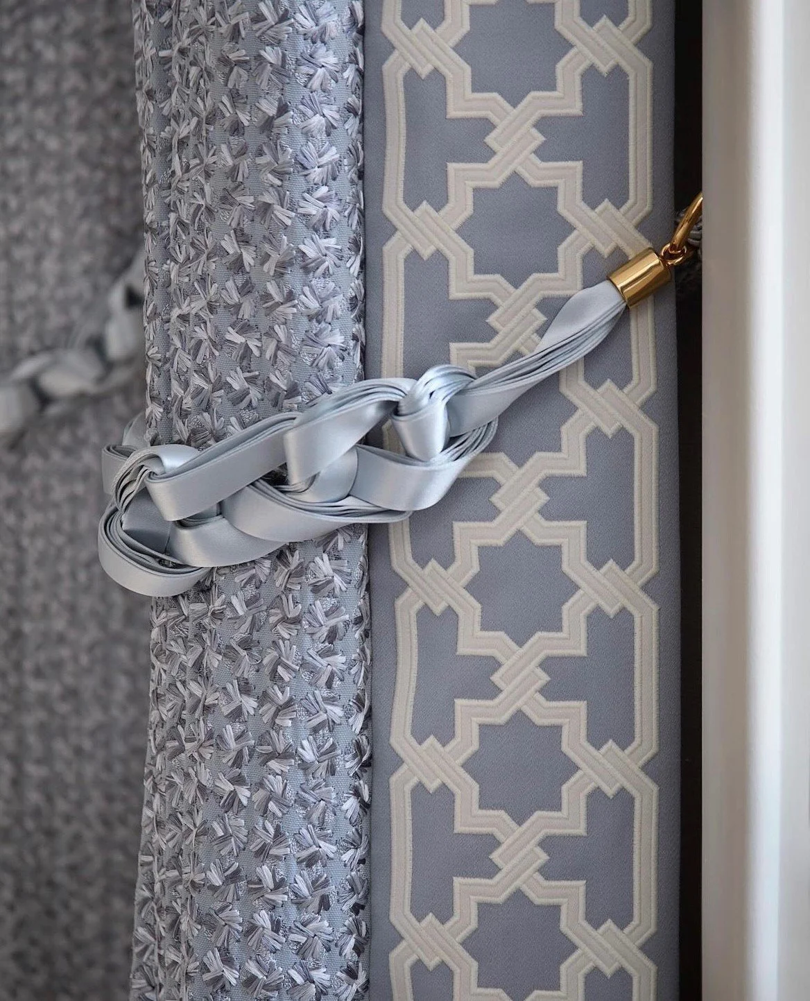 Detail of Ellice design applique technique. Wool motif on soft wool sateen ground fabric