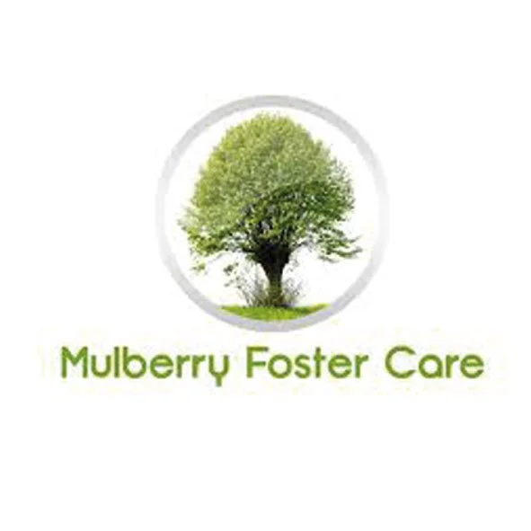 Logo for Mulberry Foster Care featuring a green tree inside a circular frame with the text 'Mulberry Foster Care' below.