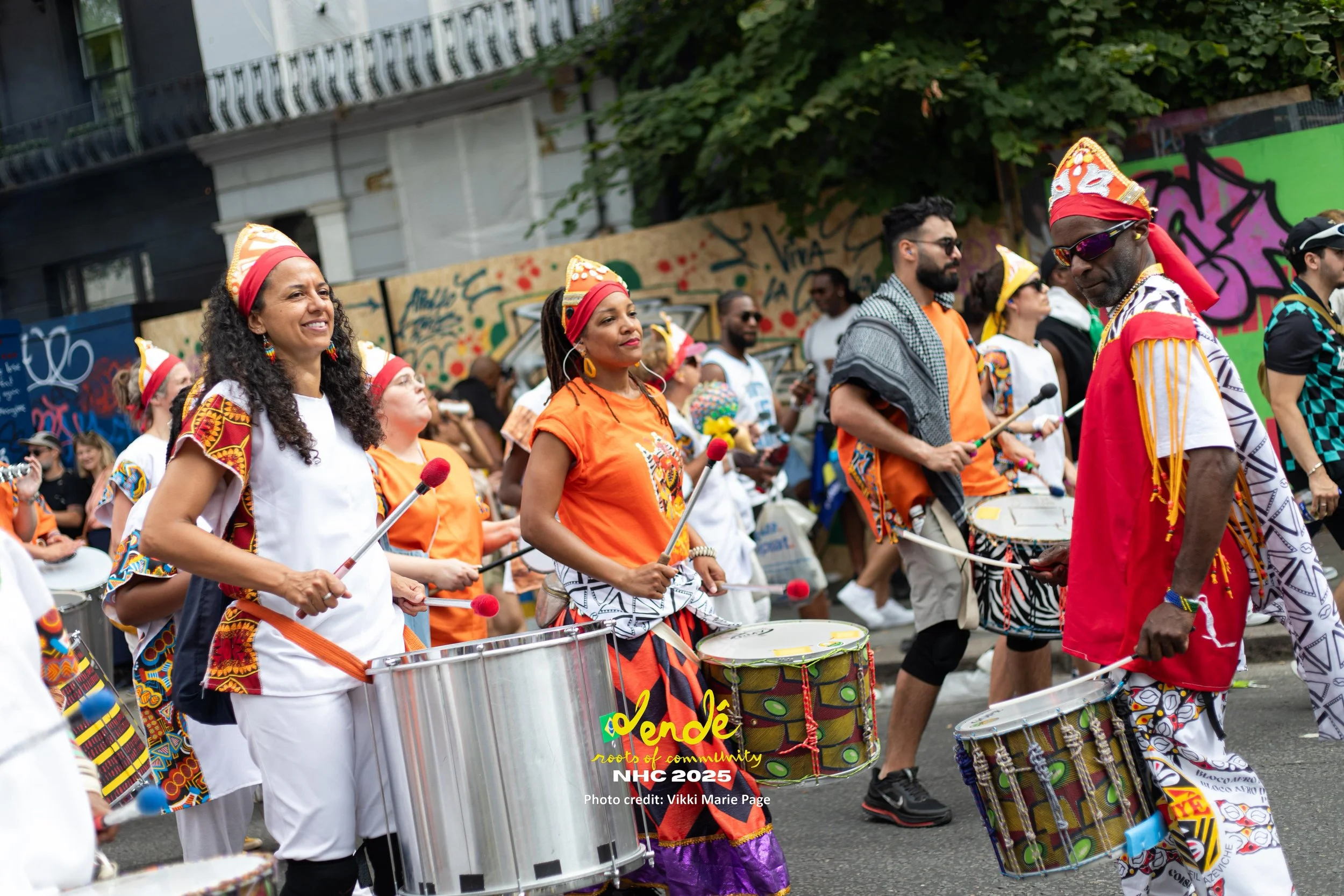 About us link showing carnival drummers