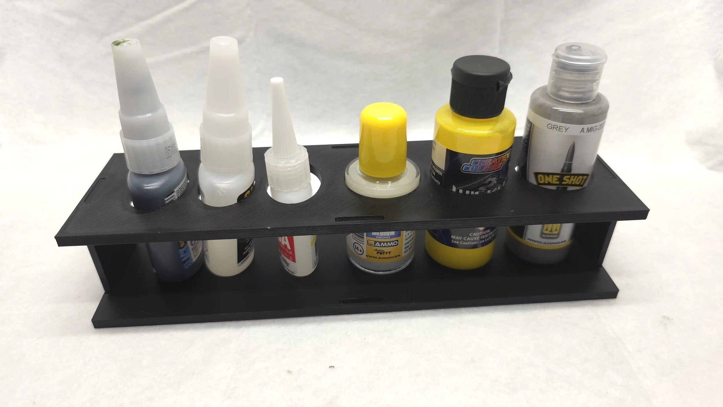 BMW Designs modular glue and bottle holder