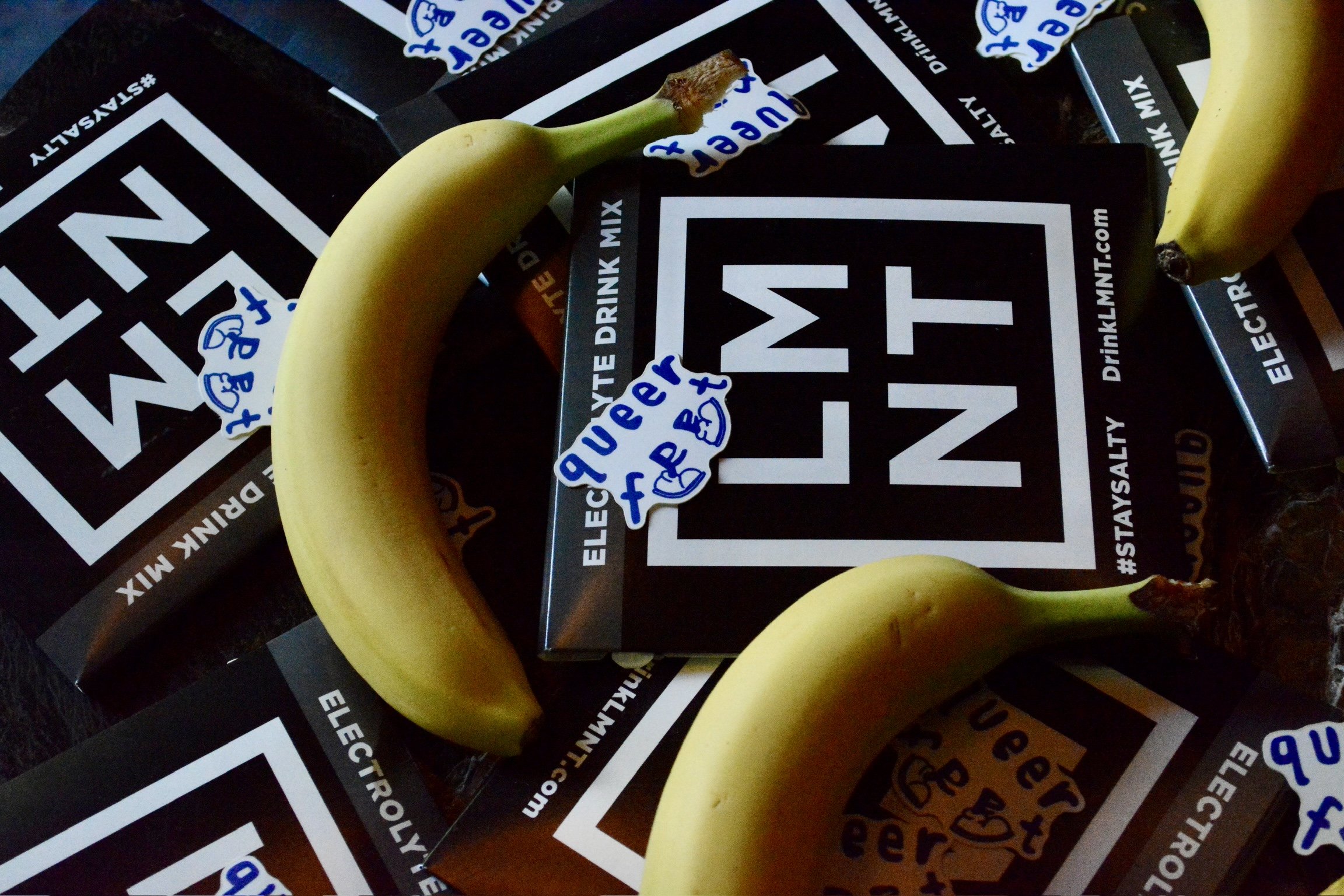 Queer Feet stickers on top of LMNT electrolyte packages