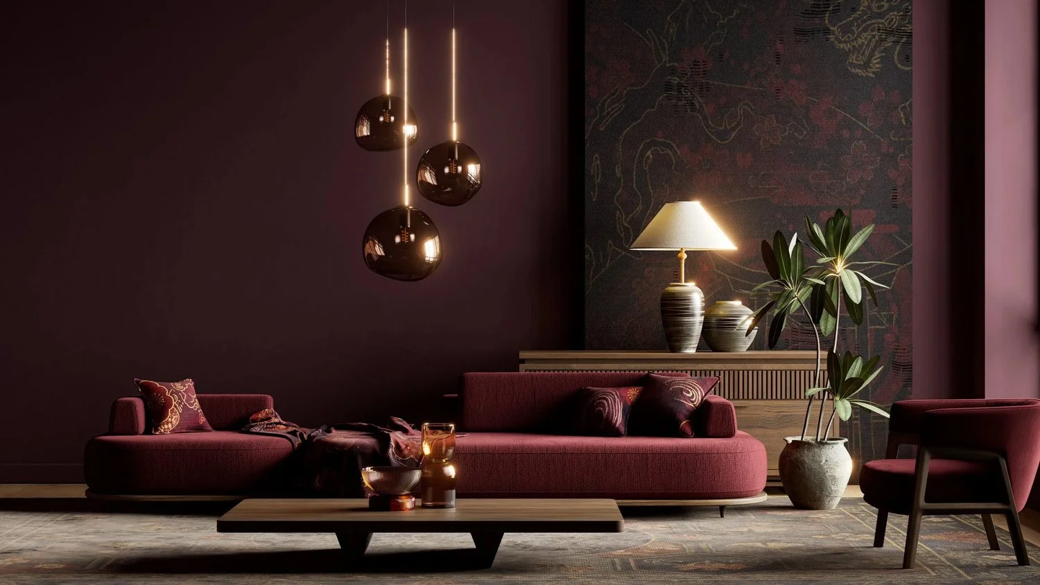 Modern living room with a maroon sofa, a coffee table with candles, a large potted plant, a dark patterned wall, and a side table with lamps