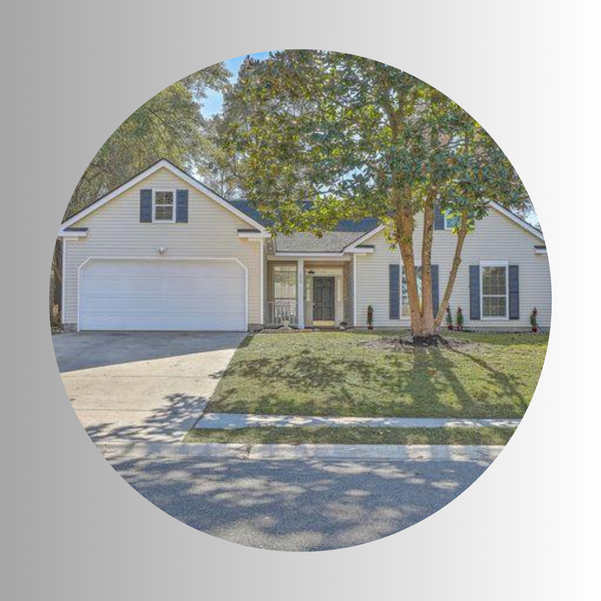 A two-story house with white siding, a garage, and a driveway, surrounded by trees and a front lawn.