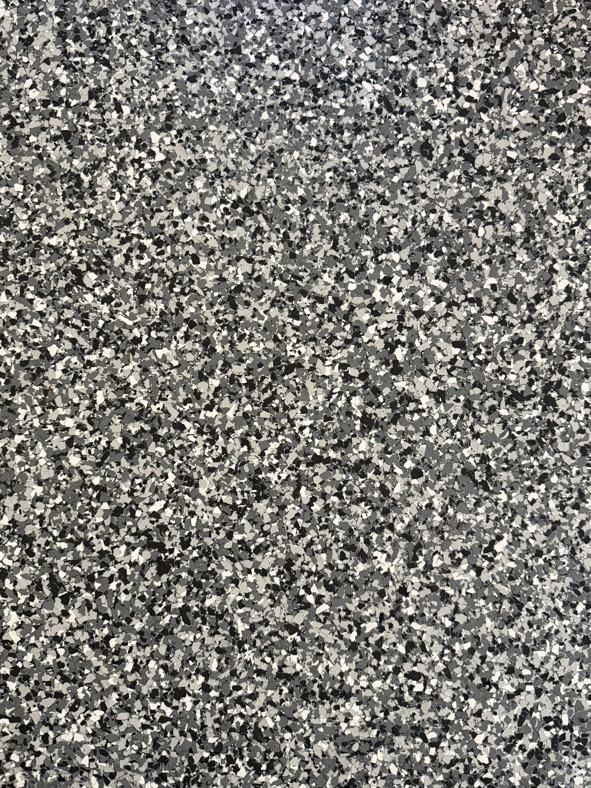 Close-up view of black, white, and gray Flake System.