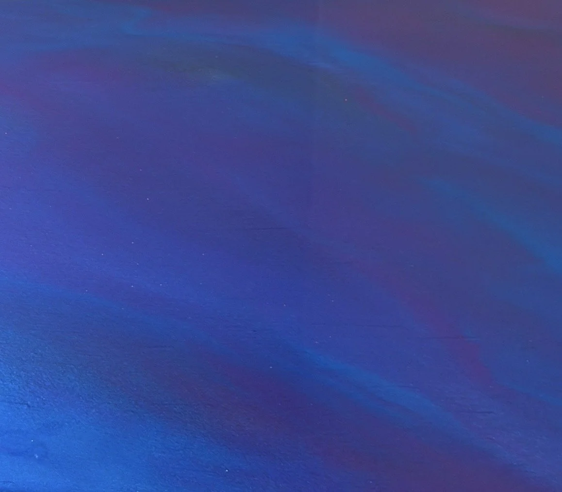 Metallic epoxy gradient with shades of blue and purple.