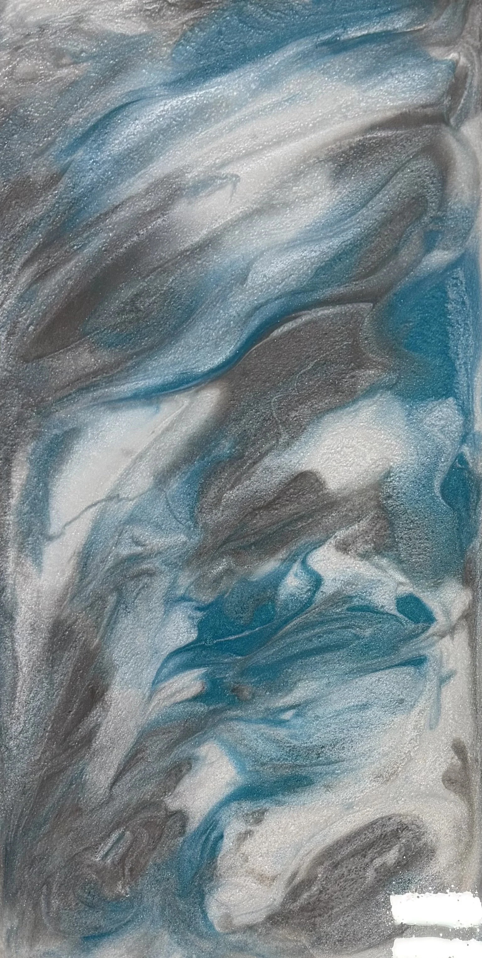 Metallic epoxy with swirling blue, gray, silver, and white colors.