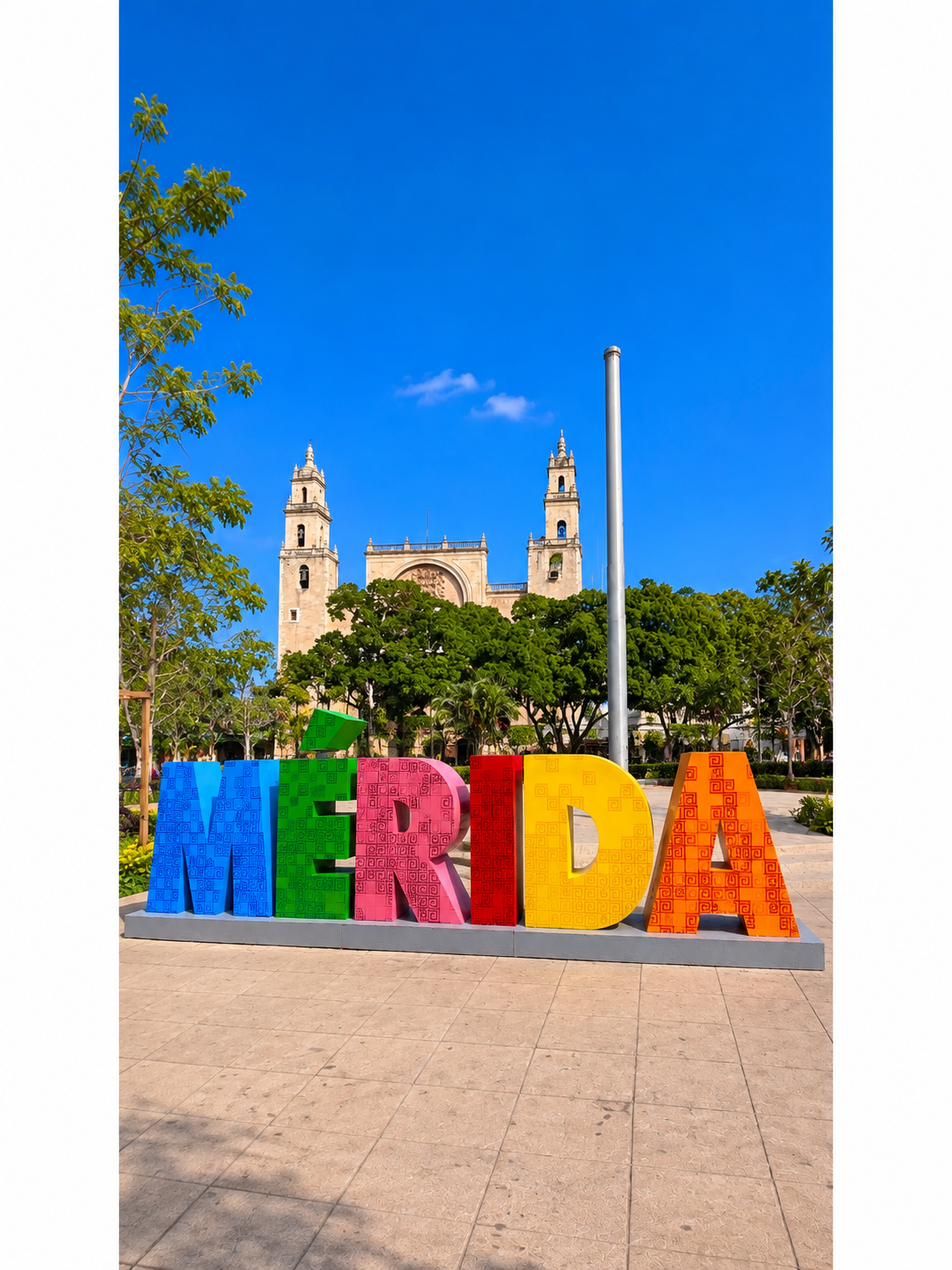 Mérida Cathedral and colorful Mérida sign in the historic center of Yucatán, Mexico