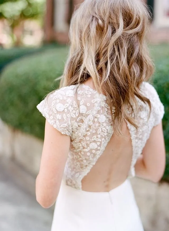 Bride with soft romantic waves in long blonde hair, styled by The Darling Salon