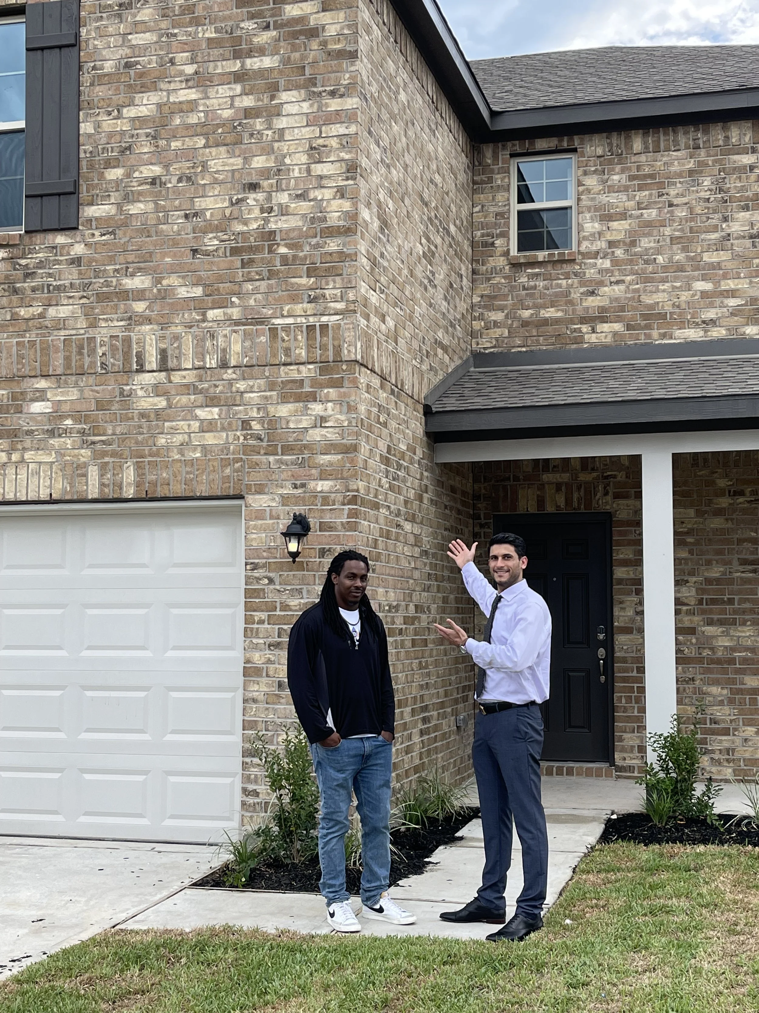 Bobby Mohebbi and his amazing client. Mohebbi Realty Group was able to help this family become a homeowner!