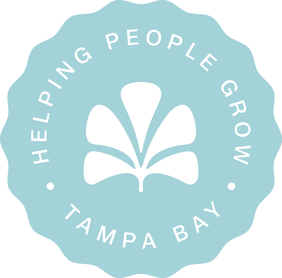 Logo featuring a stylized flower with five petal shapes inside a light blue circular outline. The text around the circle reads "Helping People Grow" on the top and "Tampa Bay" on the bottom.