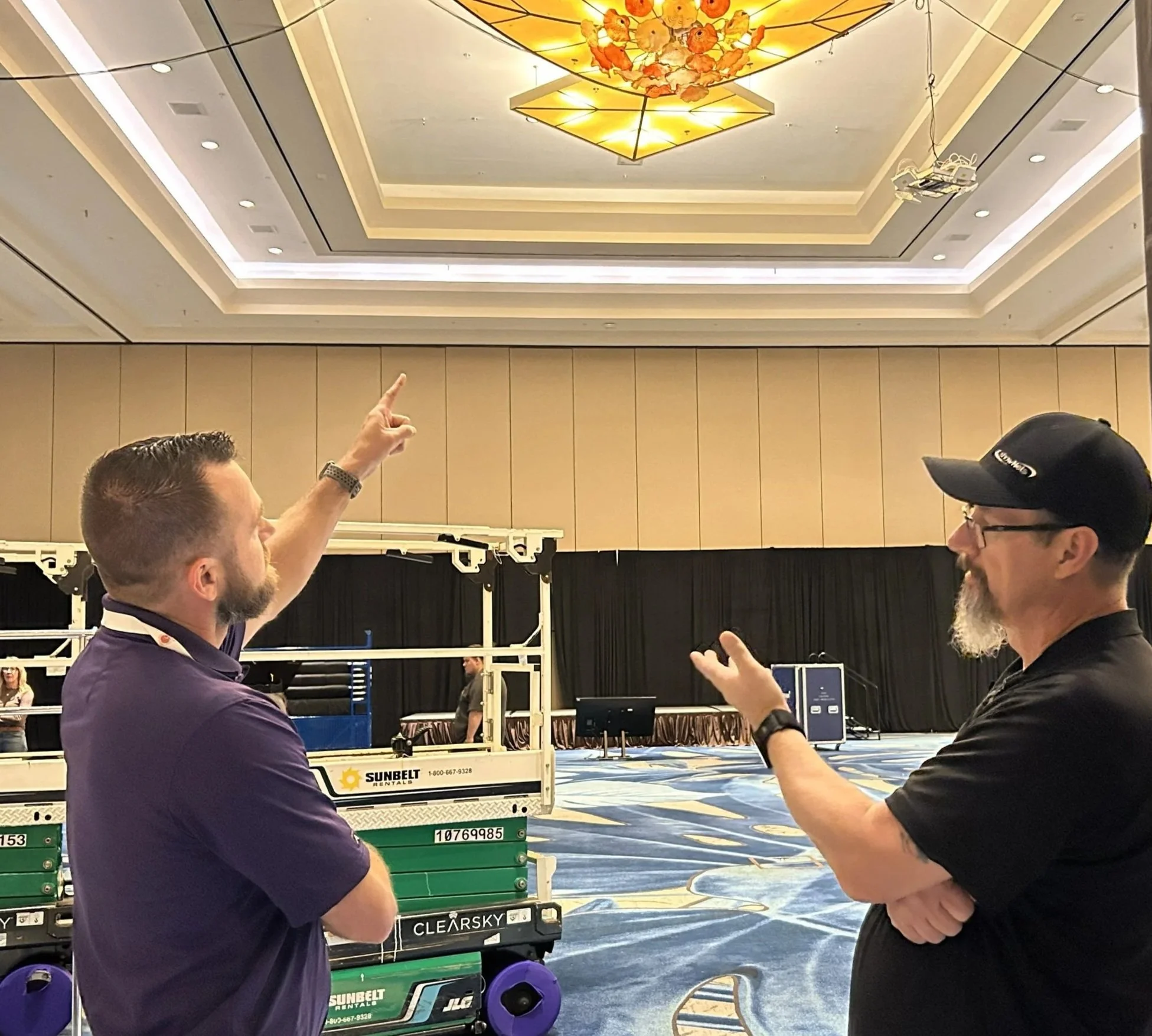 showNets Technicians prepare to install Wireless Access Points in the ceiling of a convention center.