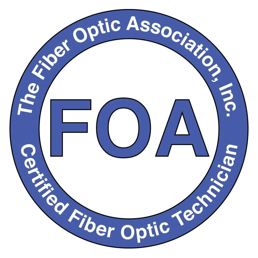 Logo of the Fiber Optic Association with the acronym FOA in the center and the full name wrapped around the circle