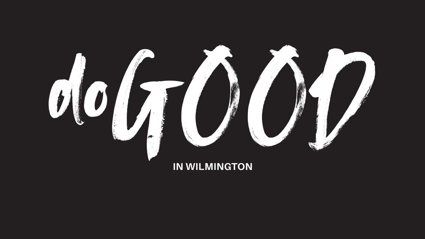 Stylized black and white text reading 'do it OOD' with smaller text below saying 'IN WILMINGTON'.
