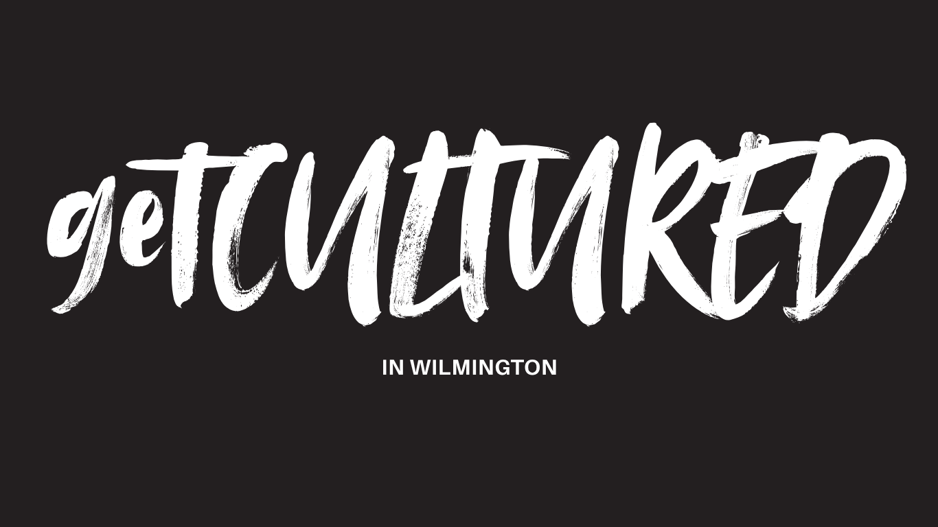Text that says 'get CULTURED' with 'IN WILMINGTON' underneath, all in white on a black background.