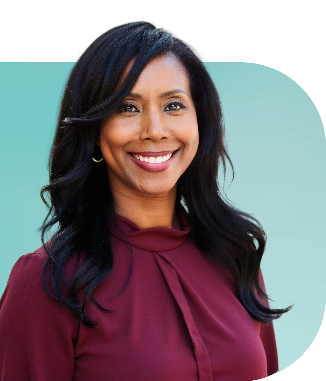 Founder Makiya Musgrove Woods with long black hair, wearing a burgundy top, smiling with white teeth, against a teal background.
