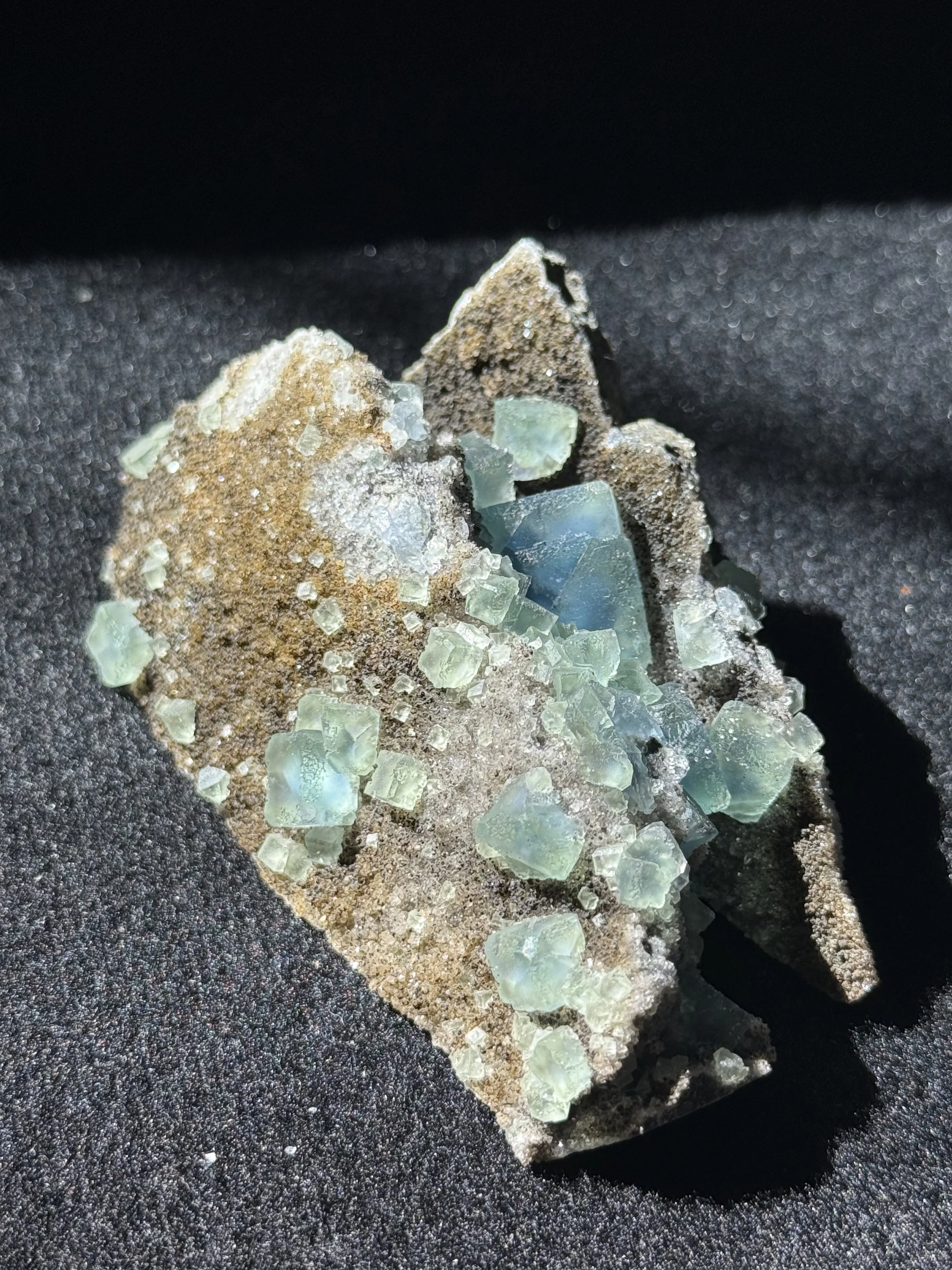 Green Fluorite with Blue Phantoms on Druzy Martix
