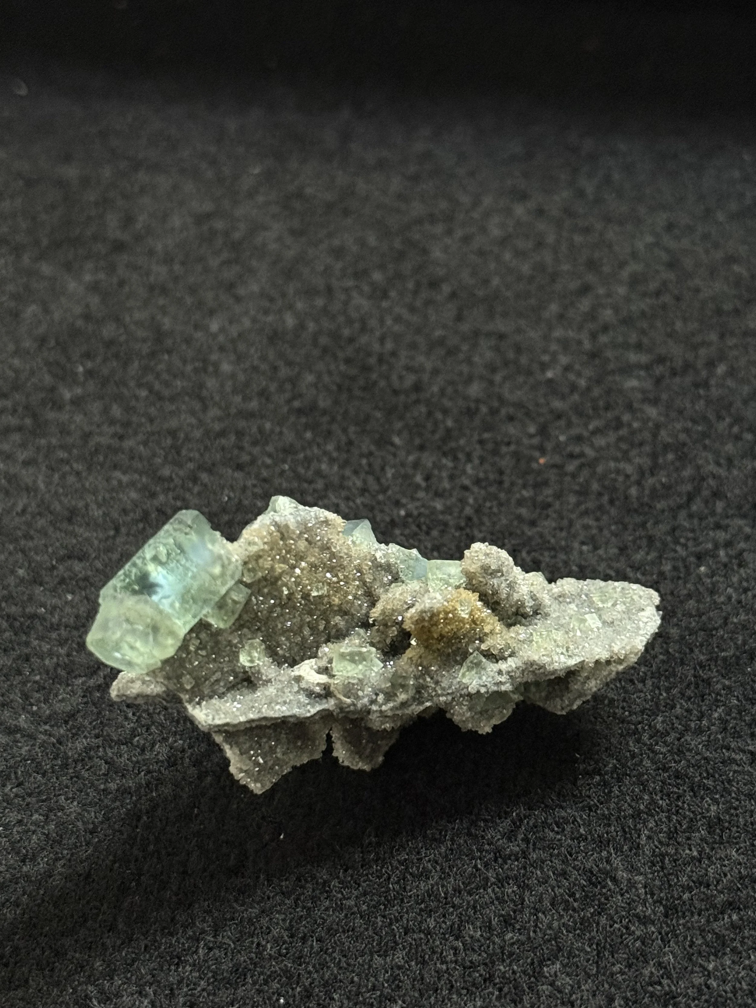 Green fluorite with Blue Phantoms on Matrix