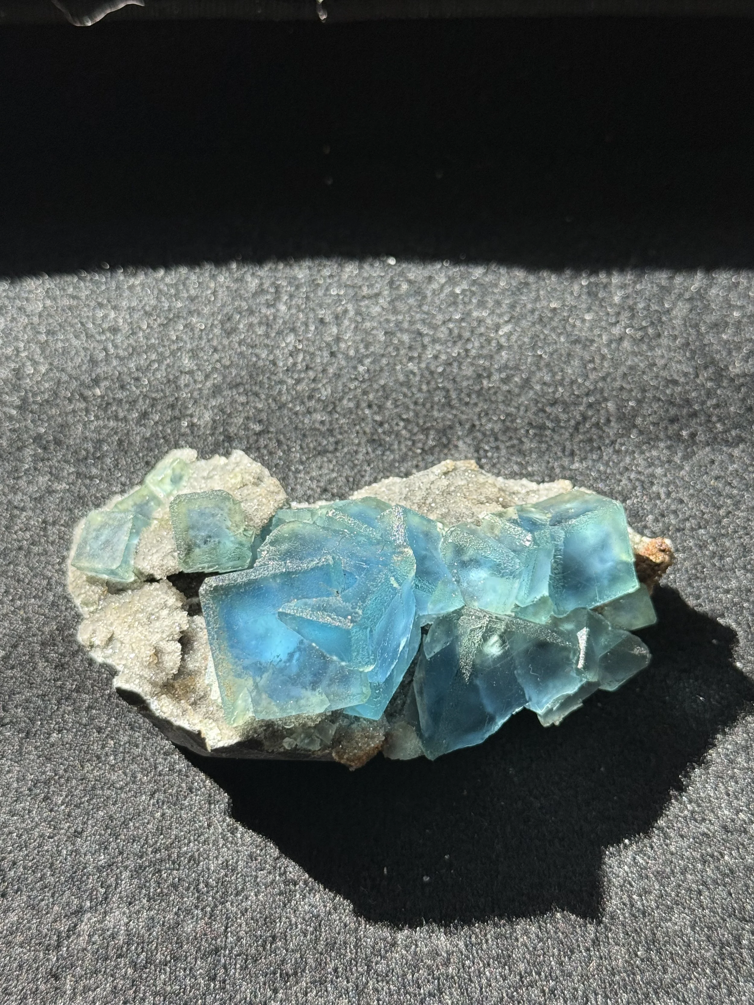 Green Fluorite with Blue phantoms on Druzy Martix