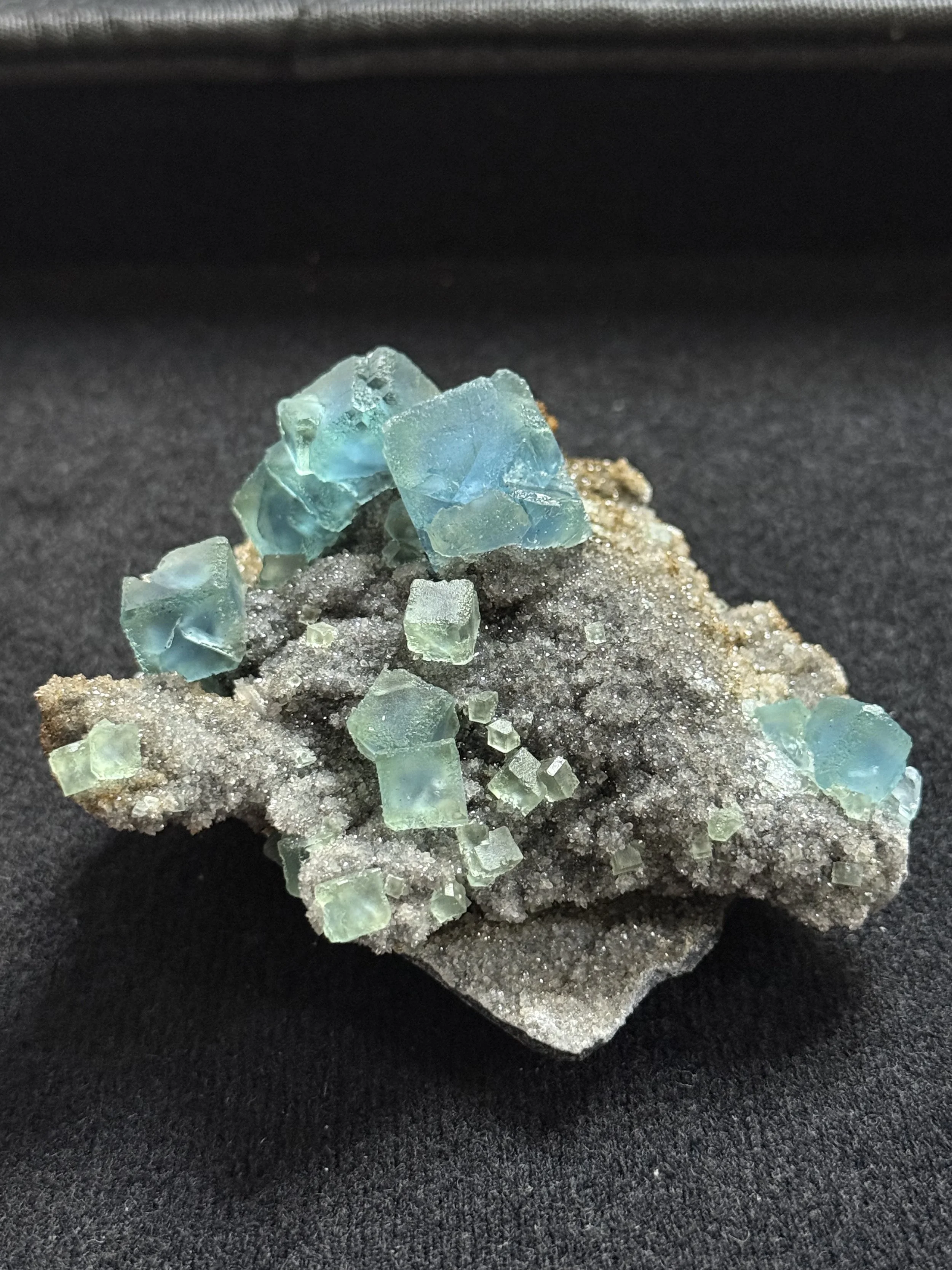 Green Fluorite with blue phantoms on Matrix