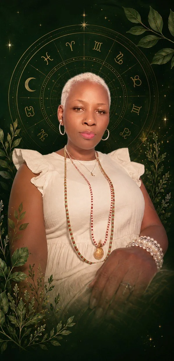 A woman with short gray hair and hoop earrings, wearing a cream-colored dress with ruffled sleeves, multiple beaded necklaces, and a bracelet, is standing in front of a celestial-themed background featuring zodiac signs, stars, a crescent moon, and green foliage.