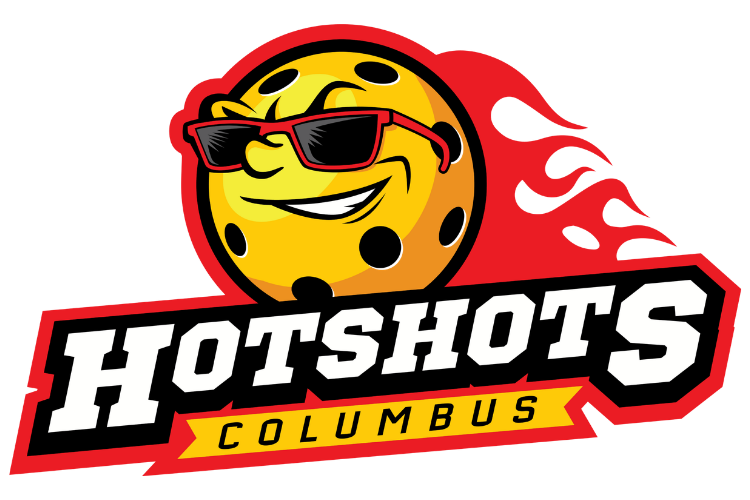 Logo for Hotshots Columbus featuring a smiling cartoon cookie wearing sunglasses, with the text 'Hotshots Columbus' in bold letters.