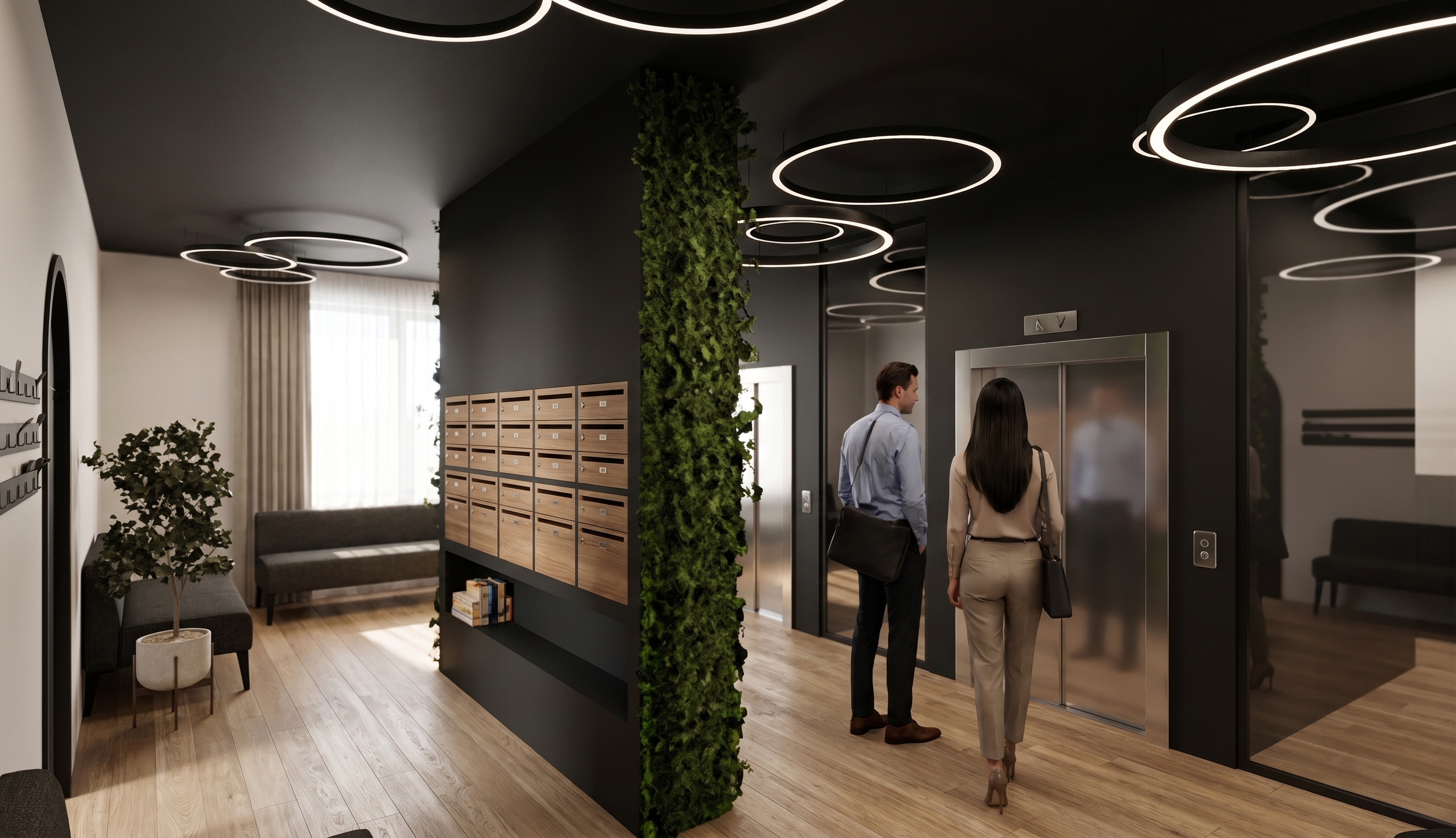 Deux personnes entrent dans un ascenseur dans un hall d'entrée moderne avec un plafond noir à anneaux de lumière, un mur central avec des boîtes aux lettres en bois et une cloison végétale.