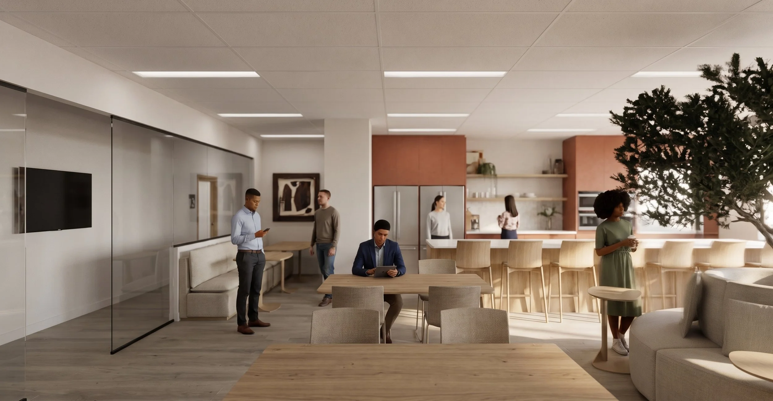 Espace de coworking moderne avec plusieurs personnes, mobilier en bois clair, cuisine en arrière-plan, et arbre décoratif