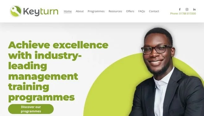 A website homepage for Keyturn with a man in glasses and a suit, smiling against a green and white background, promoting industry-leading management training programs.