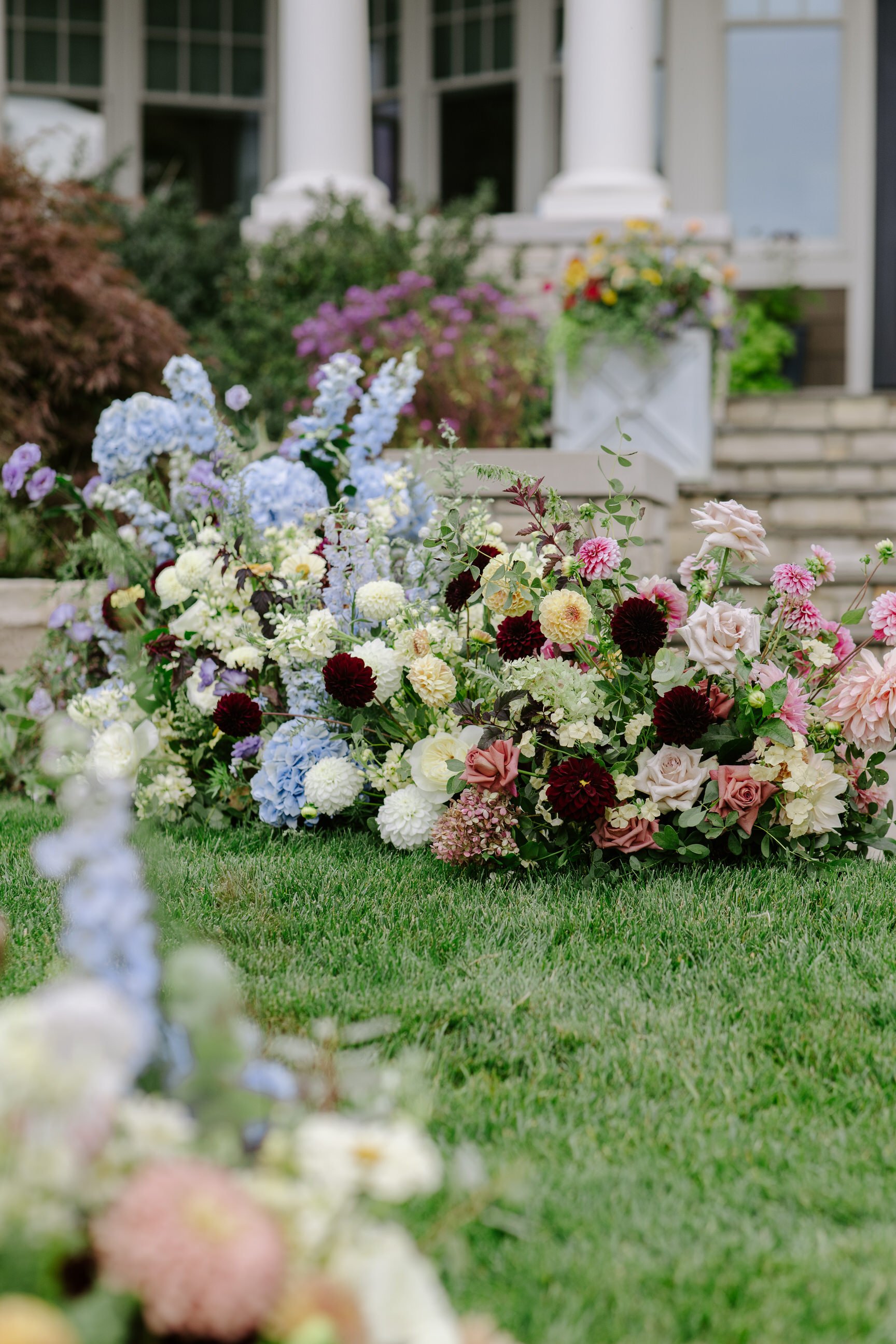 Whimsical meets classic with these stunning flower arrangements for this douglas, mi wedding