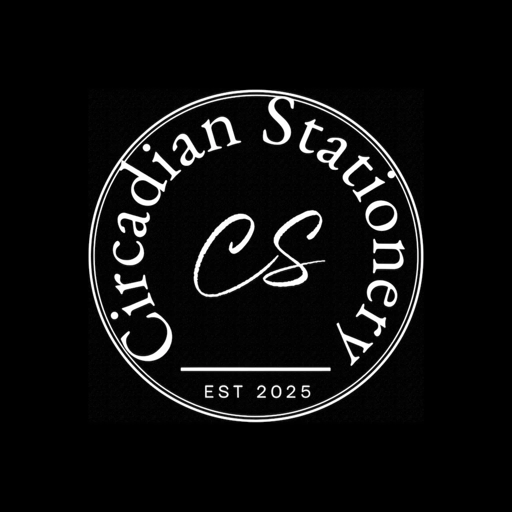 A circular logo with white text on a black background. The text reads "Cirishadian Stationery" around the circle, with "EST 2025" at the bottom.
