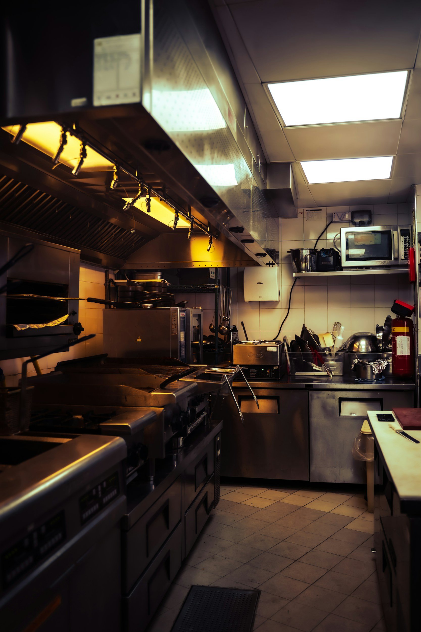 Commercial vent hood fabrication and kitchen suppression system installation
