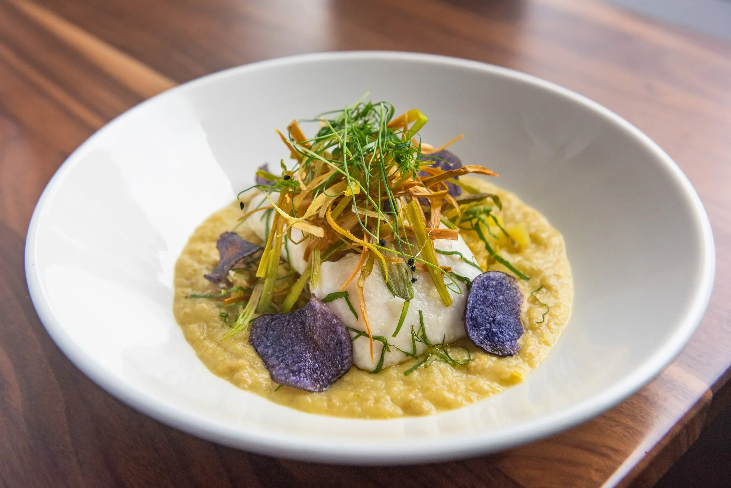 Olive oil poached halibut with potato-leek chowder