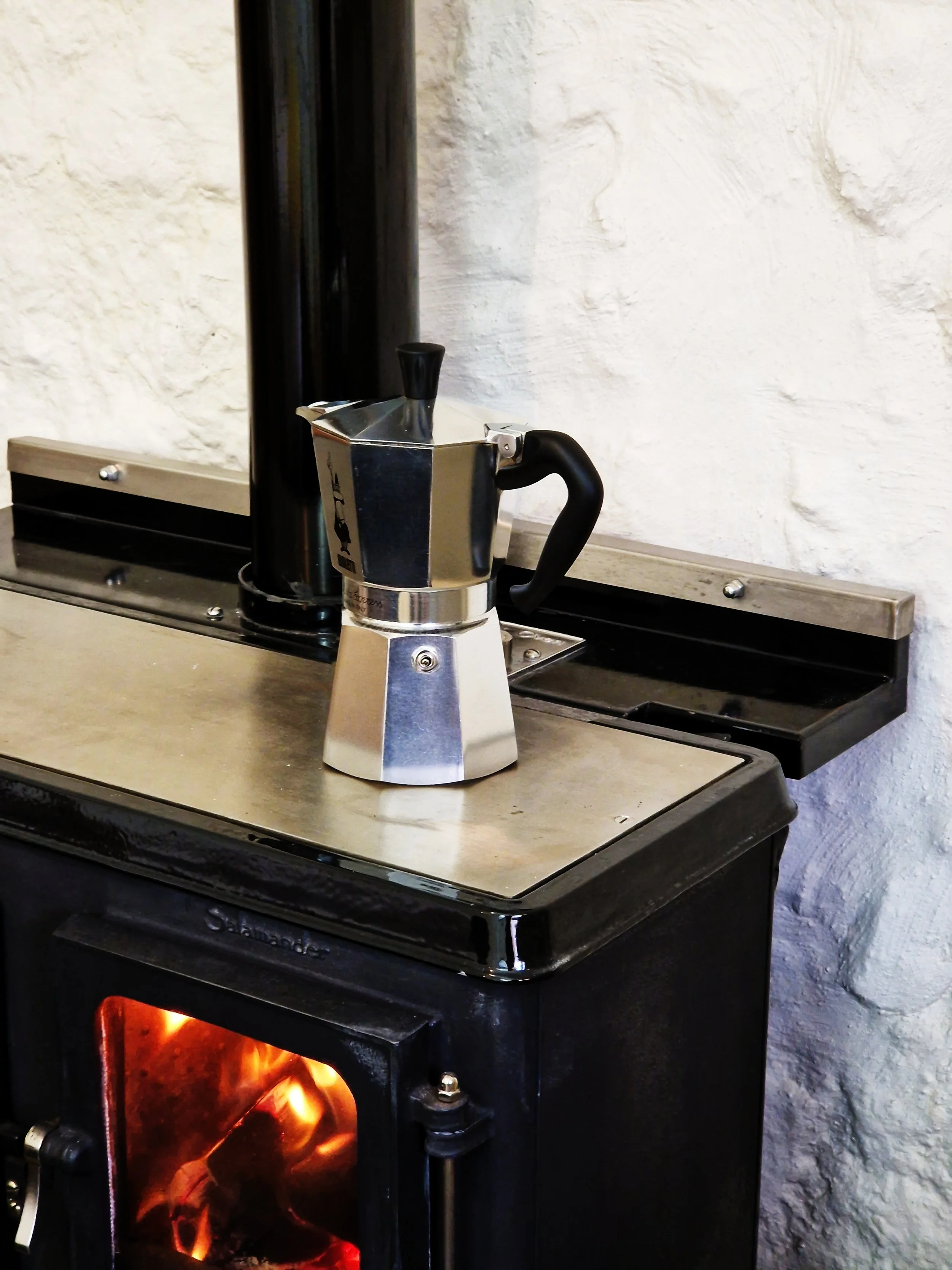 Wood Stove in Both for cooking and enjoying a whisky by the fire