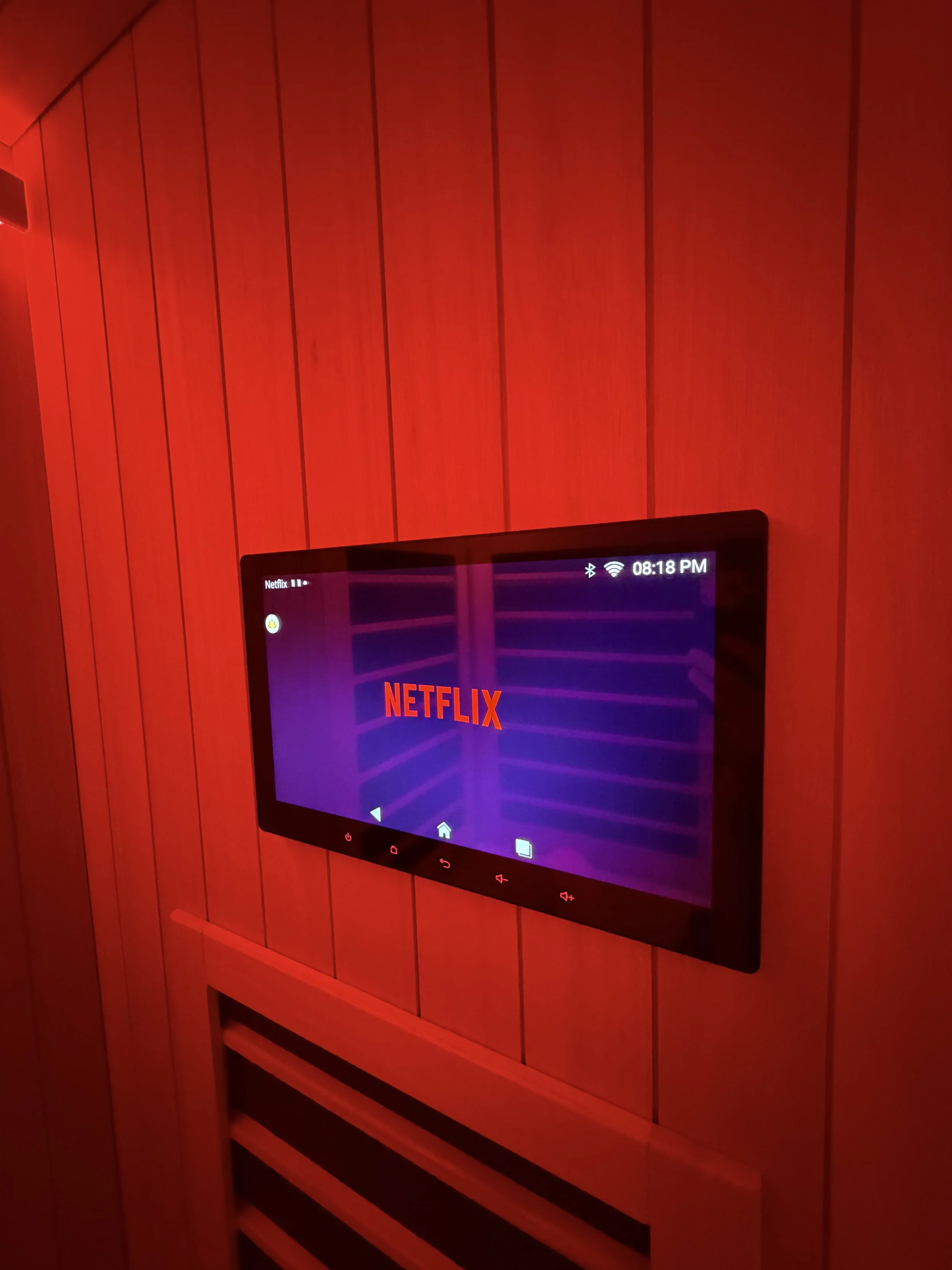 The Cold Room's Sunlighten infrared sauna with inbuilt TV showcasing Netflix. Spotify also available.