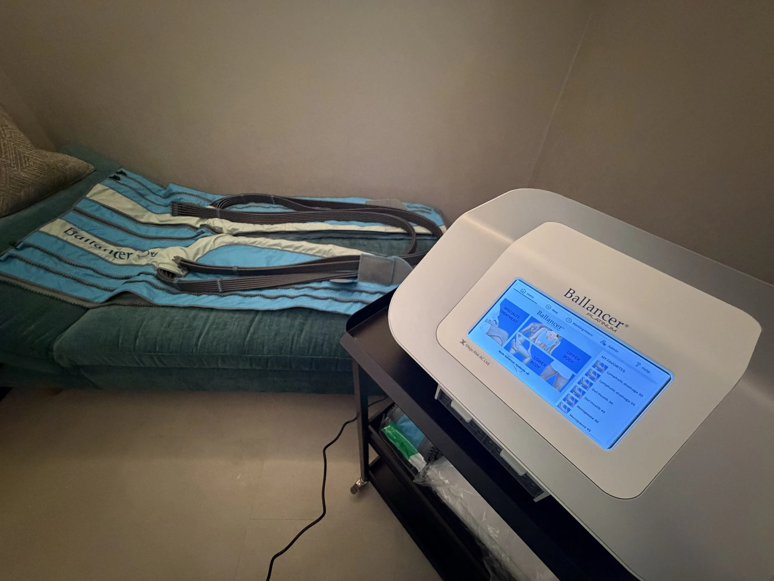 The Cold Room's Body Ballancer control unit and lower body compression suit in the private treatment room.