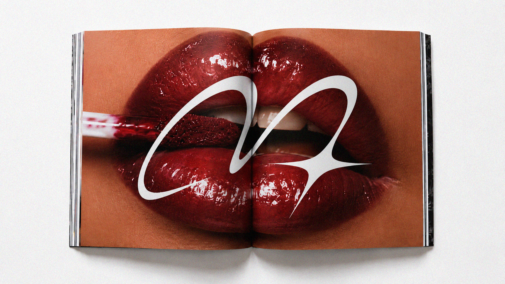 Close-up of a person's lips with glossy dark red lipstick, with the word 'COOL' overlayed in large white cursive font.