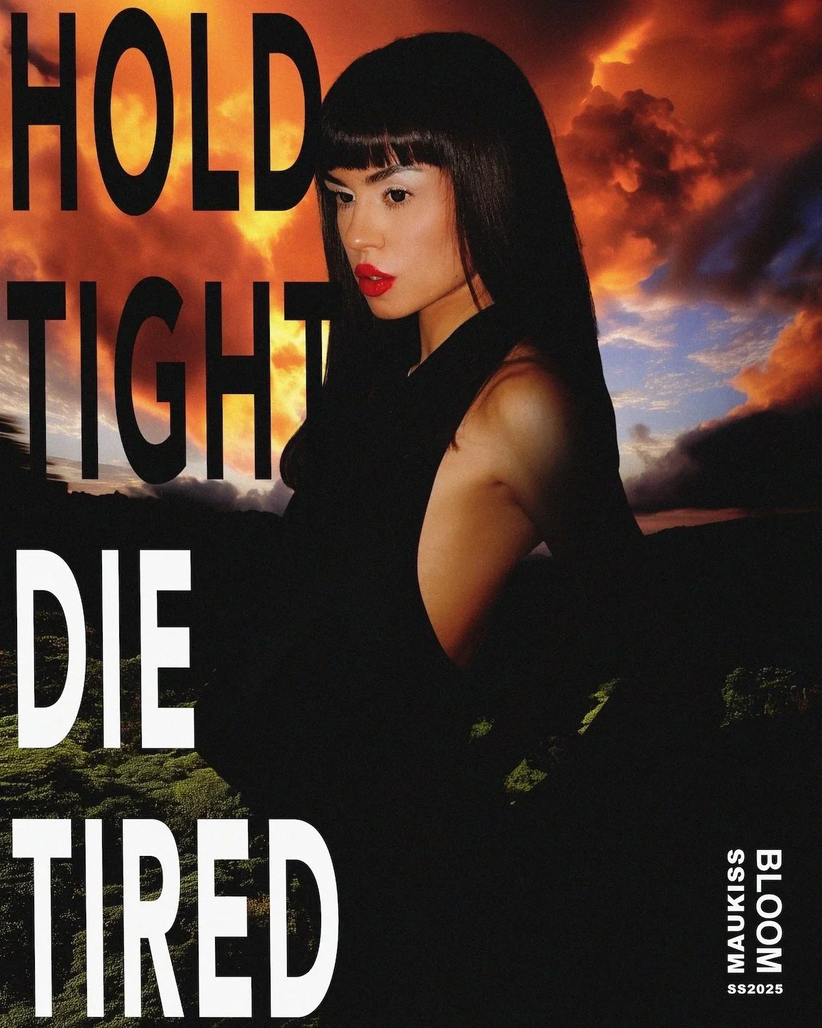 A woman with black hair and red lipstick posing against a dramatic sunset sky with dark clouds. Large text on the image reads "HOLD TIGHT" and "DIE TIRED," with smaller text indicating "MAUKISS BLOOM" and "SS2025."