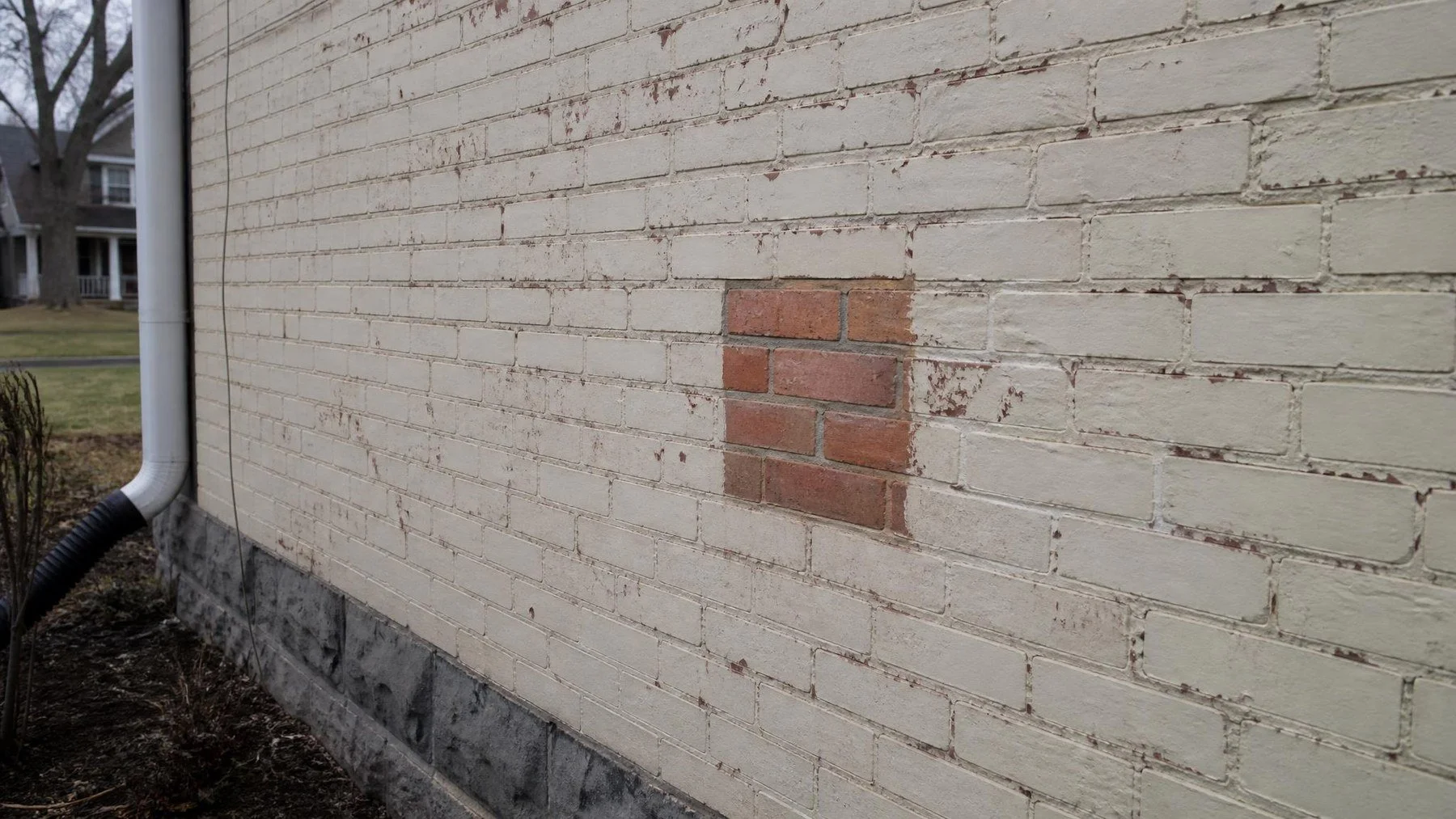 removing paint from brick test patch on masonry