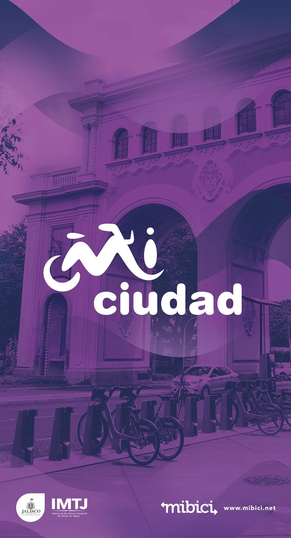 Distintivo "Mi Ciudad" de la marca Mi Bici sobre un fondo urbano de Guadalajara
